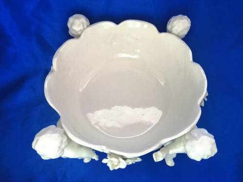 Beautiful White Italian Continental blanc de Chine center bowl depicting four putti Cherubs