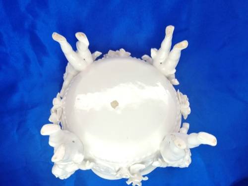 Beautiful White Italian Continental blanc de Chine center bowl depicting four putti Cherubs