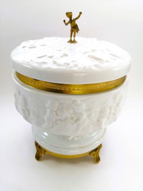 Continental blanc de Chine gilt metal mounted bowl depicting putti Cherubs