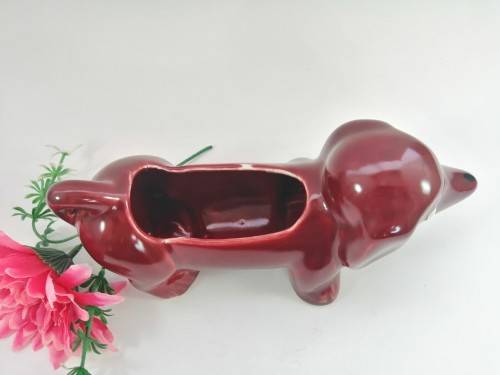 Very cute vintage burgundy Dachshund Sausage Dog holder