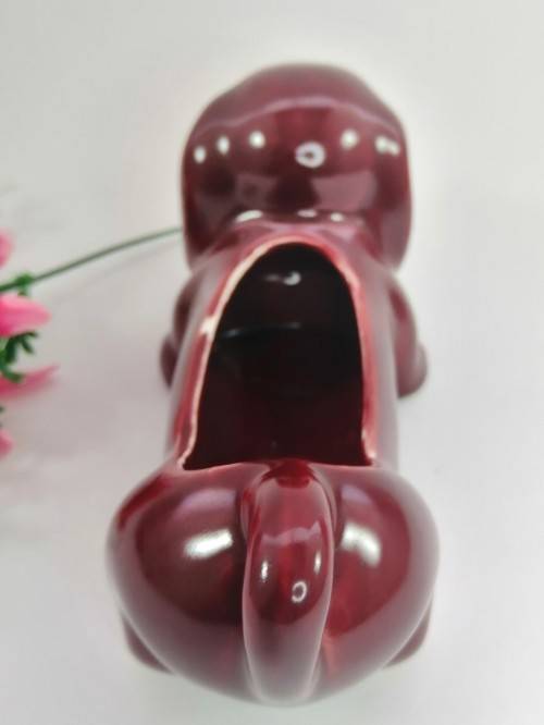 Very cute vintage burgundy Dachshund Sausage Dog holder