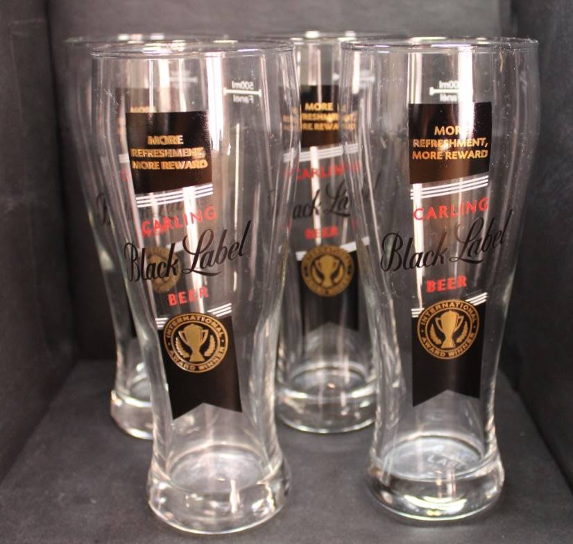 Set of Four Carling Black Label 500ml Beer Glasses.