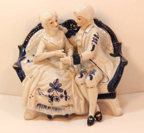 Classic Style Courting Couple Seated Porcelain Figurine
