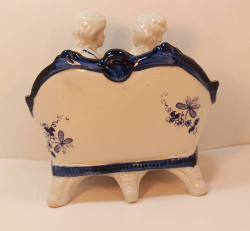 Classic Style Courting Couple Seated Porcelain Figurine