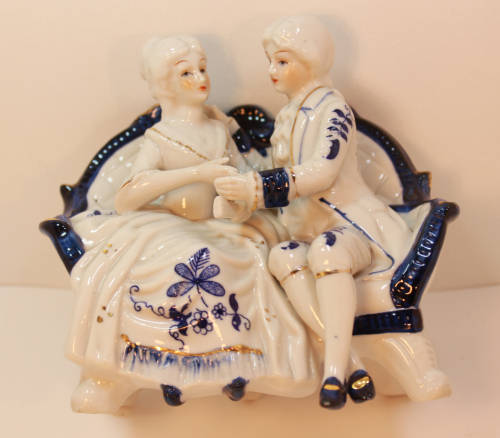 Classic Style Courting Couple Seated Porcelain Figurine