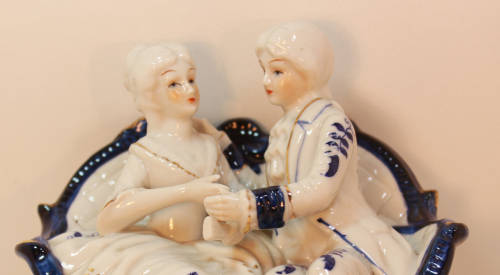 Classic Style Courting Couple Seated Porcelain Figurine
