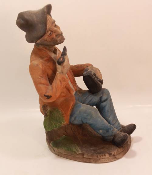 Vintage Porcelain Figurine of Old Man with Tobacco Pouch and Pipe