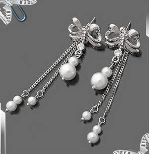 Silver Bow Dangling Earrings