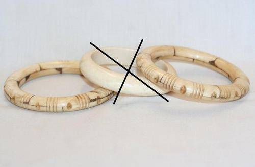TWO IVORY/BONE BANGLES