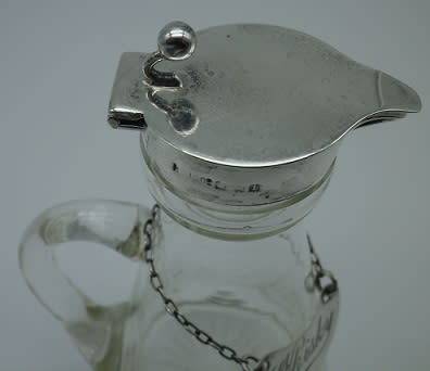 Whisky Noggin with hallmarked silver lid and label. HB Johnson and Company, B/ham 1910. 11cm