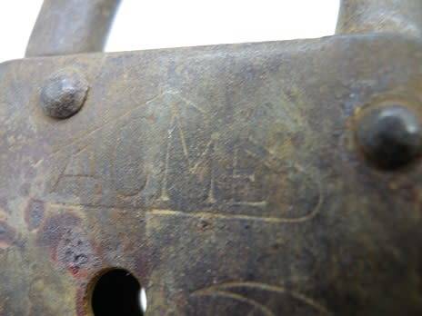 Vintage ACME padlock and key. Rusty & characterful. WORKS!!