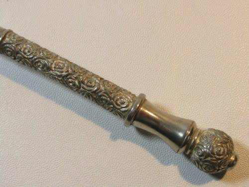 Ornate, heavy candle snuffer. Silver tone metal, fabulous quality. Possibly pewter. 20cm