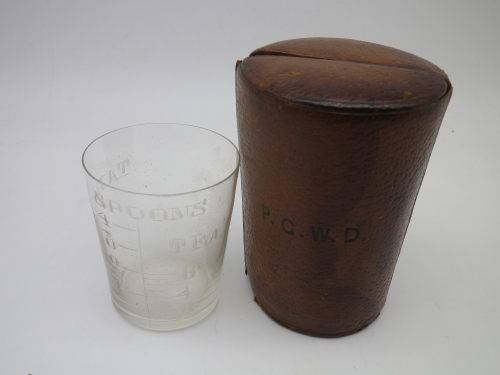 Vintage travelling medicine measure in leather case. Finnigans Bond Street, London