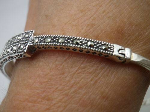 STERLING SILVER & MARCASITE BANGLE. 10.8 grms; 6.3 x 5.4 x 0.7mm. BEAUTIFUL!