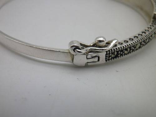STERLING SILVER & MARCASITE BANGLE. 10.8 grms; 6.3 x 5.4 x 0.7mm. BEAUTIFUL!