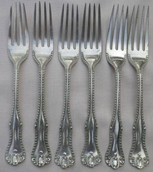 Six gloriously ornate Antique 1882-1887 Frederick Wilson & Co Afghan Silver forks