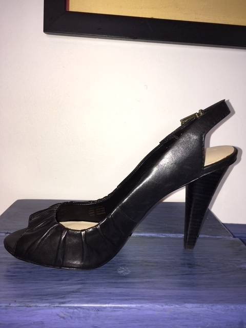 Black peep-toe sling back heels