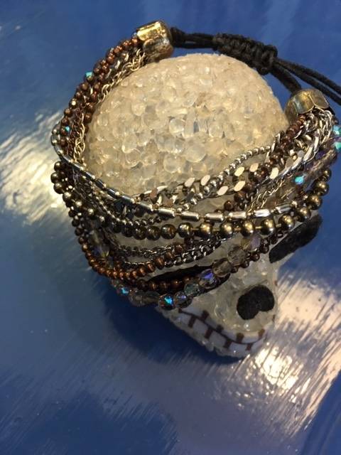 Multi-chain drawstring bracelet with iridescent beading