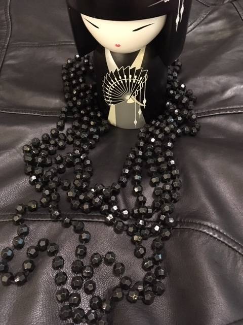 Black multi strand geometric beaded necklace