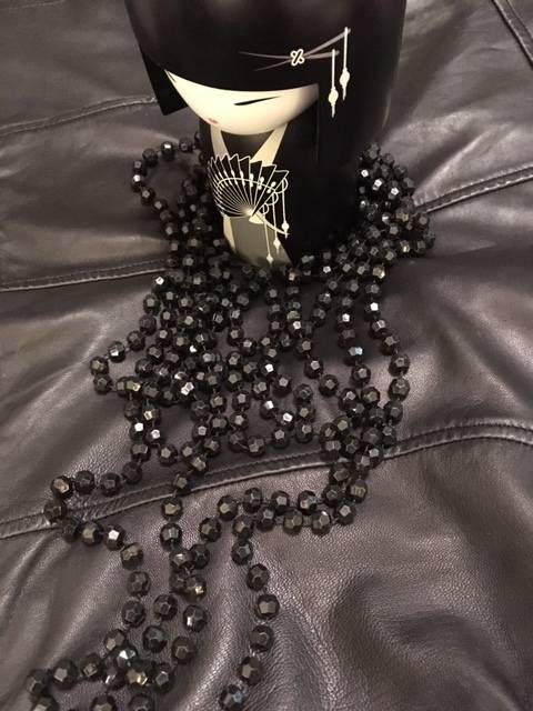Black multi strand geometric beaded necklace