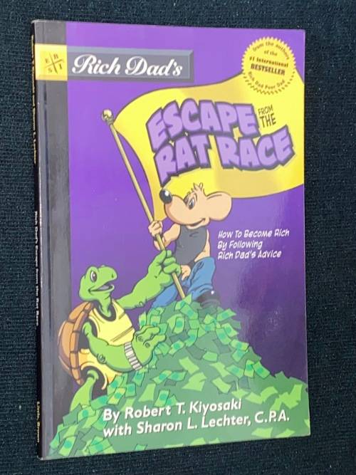 RICH DAD`S ESCAPE THE RAT RACE BY ROBERT T. KIYOSAKI