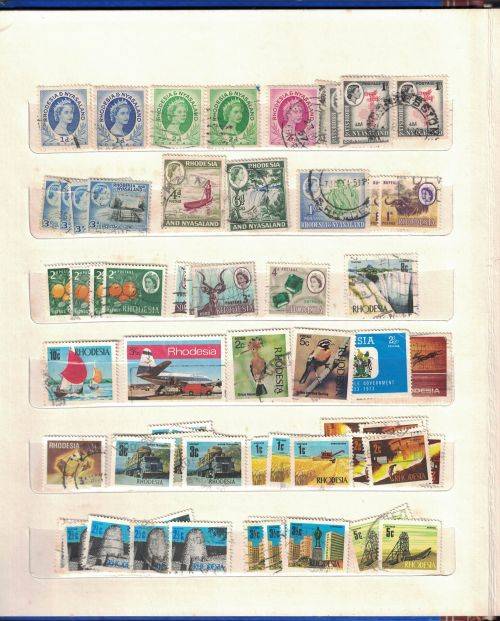 Stock Album with used  Rhodesia, Zambia, Malawi, Lesotho (a lot UMM), Swaziland and Kenya