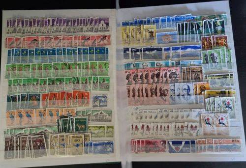 A4 Stock Album stacked with mostly used Union and RSA stamps
