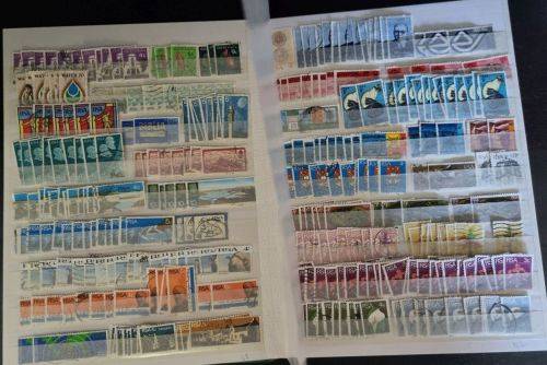 A4 Stock Album stacked with mostly used Union and RSA stamps