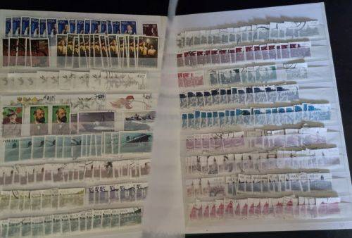 A4 Stock Album stacked with mostly used Union and RSA stamps