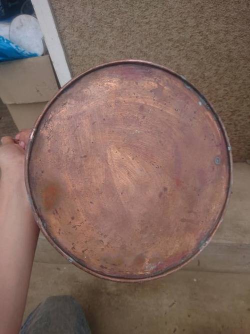 large copper water jug