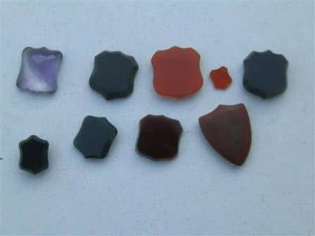 Lovely lot of 9 unset gemstone shields - blood stone, carnelian, amethyst.