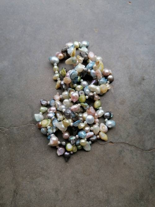 Vars water perels/fresh water pearls . Stunning string!!!!!