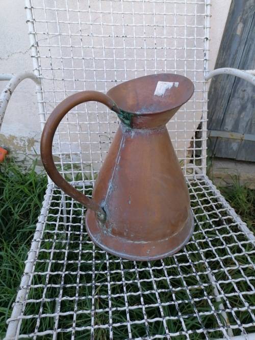 large copper water jug