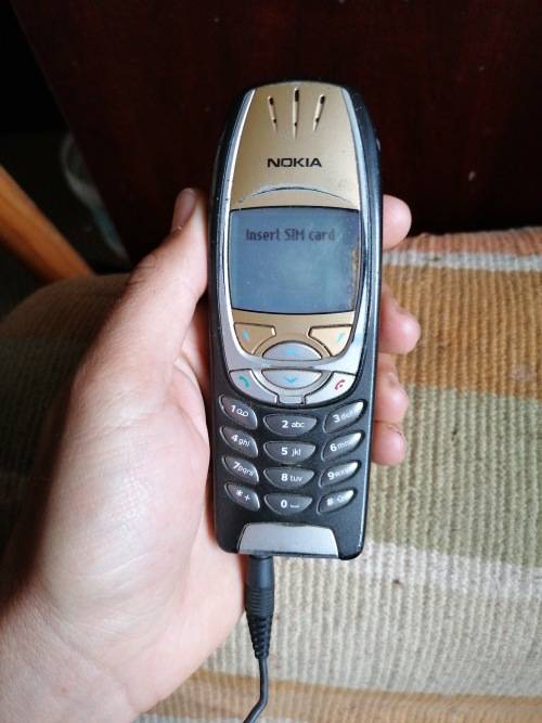 Nokia model 6310i with a original house charger as well and one phone for parts