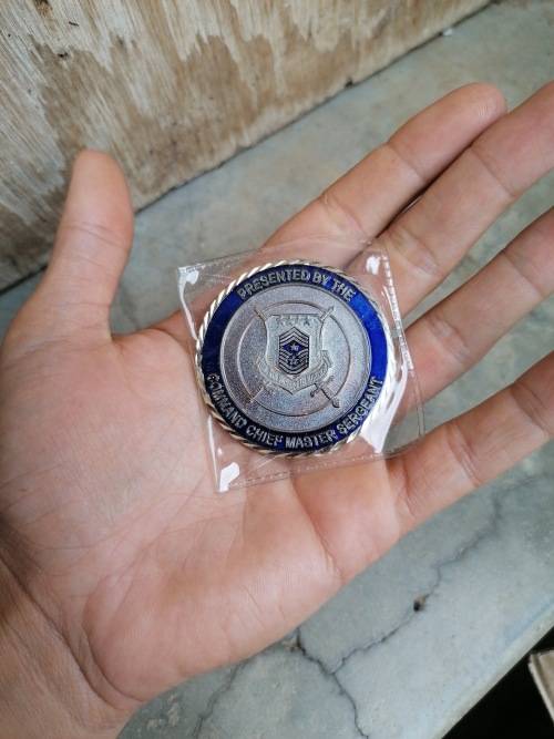 presented by the command chief master sergeant coin