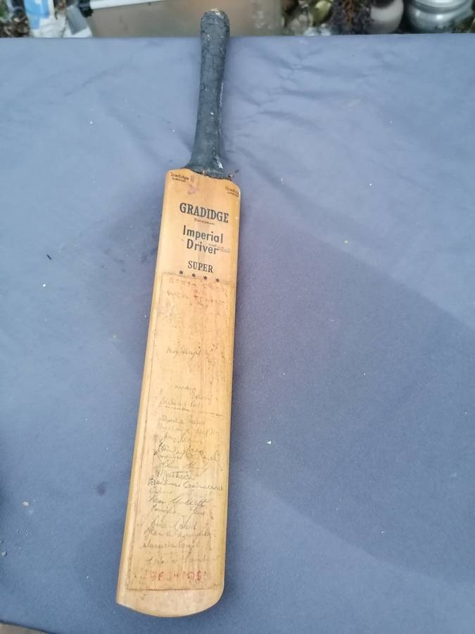 Signed minature cricket at. Appears to be dated 1960s