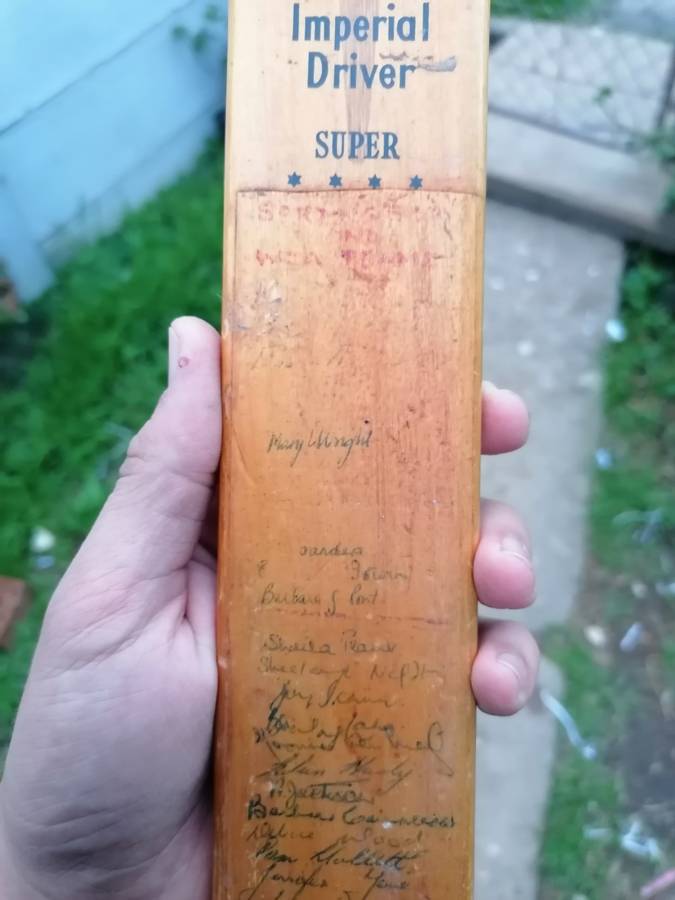 Signed minature cricket at. Appears to be dated 1960s