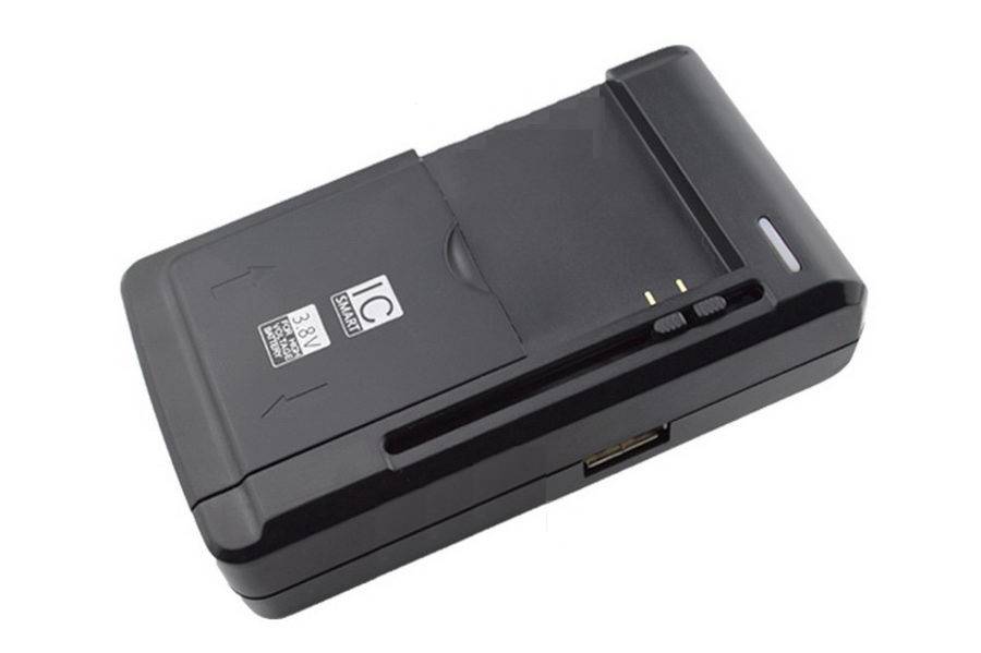Universal Charger for Cellphone/Flat Battery with USB Charging Port (Black)..!