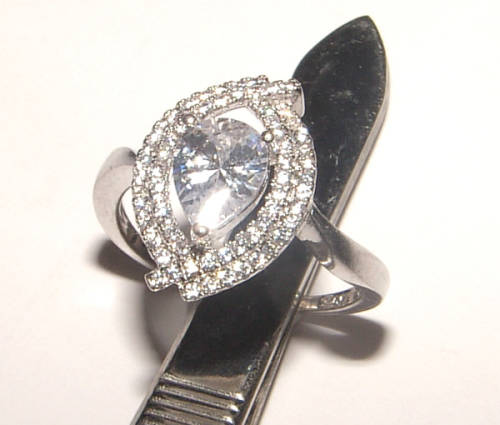 PURE PERFECTION! SOLID .925 STERLING SILVER RING WITH SIMULATED DIAMONDS!