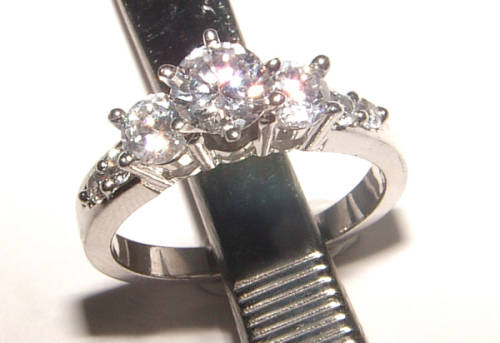 PURE PERFECTION! SOLID .925 STERLING RING WITH SIMULATED DIAMONDS!