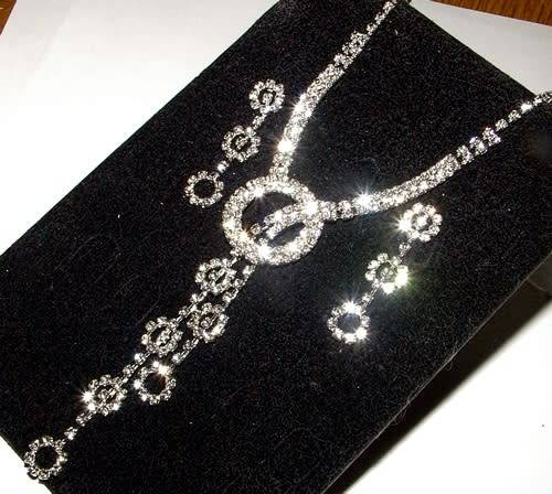 RHINESTONE ENCRUSTED SILVER NECKLACE AND EARRINGS SET