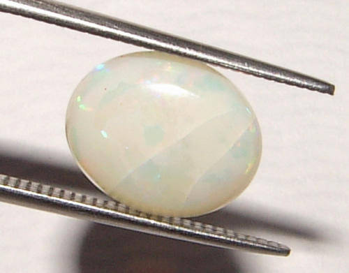 AUSTRALIAN OPAL -  MULTICOLOUR OVAL CUT  - 2.430cts!!