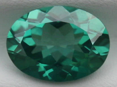 NATURAL TOPAZ -  EMERALD GREEN OVAL CUT - 1.490cts
