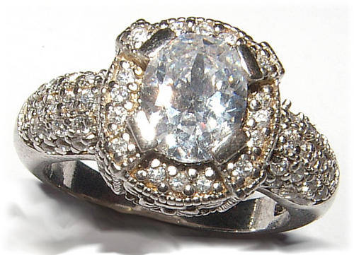 WHITE CZ STERLING SILVER RING.
