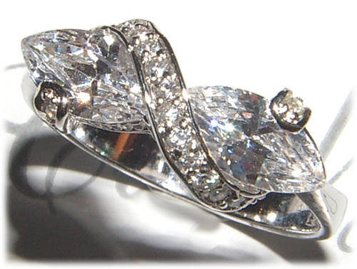 MULTI STONE WHITE CZ STERLING SILVER RING.