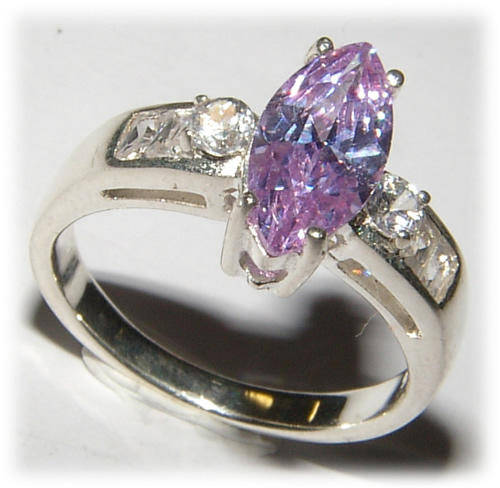 LAVENDER CZ STERLING SILVER RING.