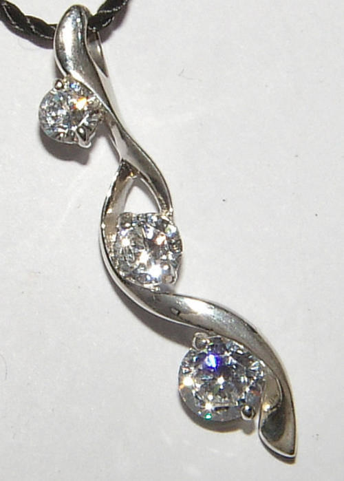 ELEGANT DIAMOND PENDANT IN .925 STERLING SILVER