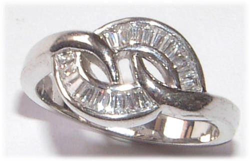 WHITE CZ STERLING SILVER RING.