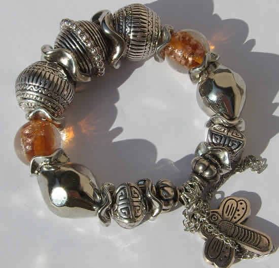 ***CHARM-ING!! STUNNING COLOURED GLASS BEADS  AND TIBETAN SILVER STRETCHY BRACELET!!