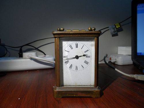 carriage clock. with case